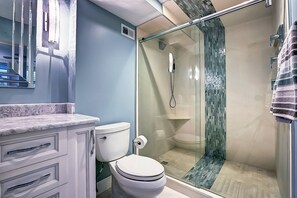 Combined shower/tub, hair dryer, towels, shampoo