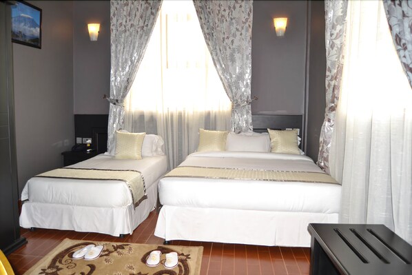 Triple Room | Desk, iron/ironing board, free WiFi - Panone Motel K.I.A (Arusha)