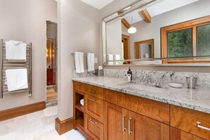 Bathtub, hair dryer, shampoo