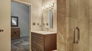 Hair dryer, towels, shampoo, toilet paper