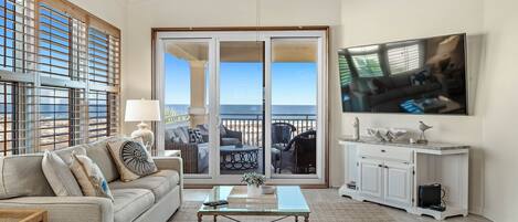 Flat-screen TV, DVD player, books, stereo