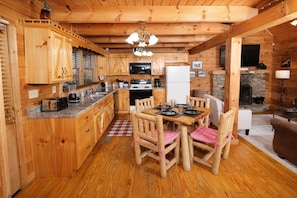 Fridge, microwave, oven, stovetop - Pet friendly 2 bedroom log cabin in Wears Valley with game room and hot tub (SEVIERVILLE)