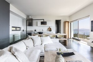 Executive Villa, 2 Bedrooms, Private Pool, Sea View | Living area | Flat-screen TV, fireplace, DVD player