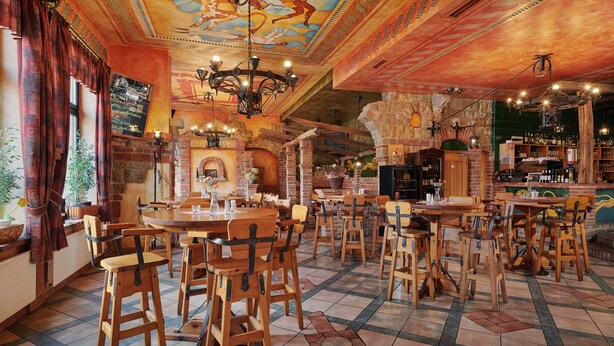 Een restaurant met houten tafels en stoelen, een bar en een muurschildering op het plafond.