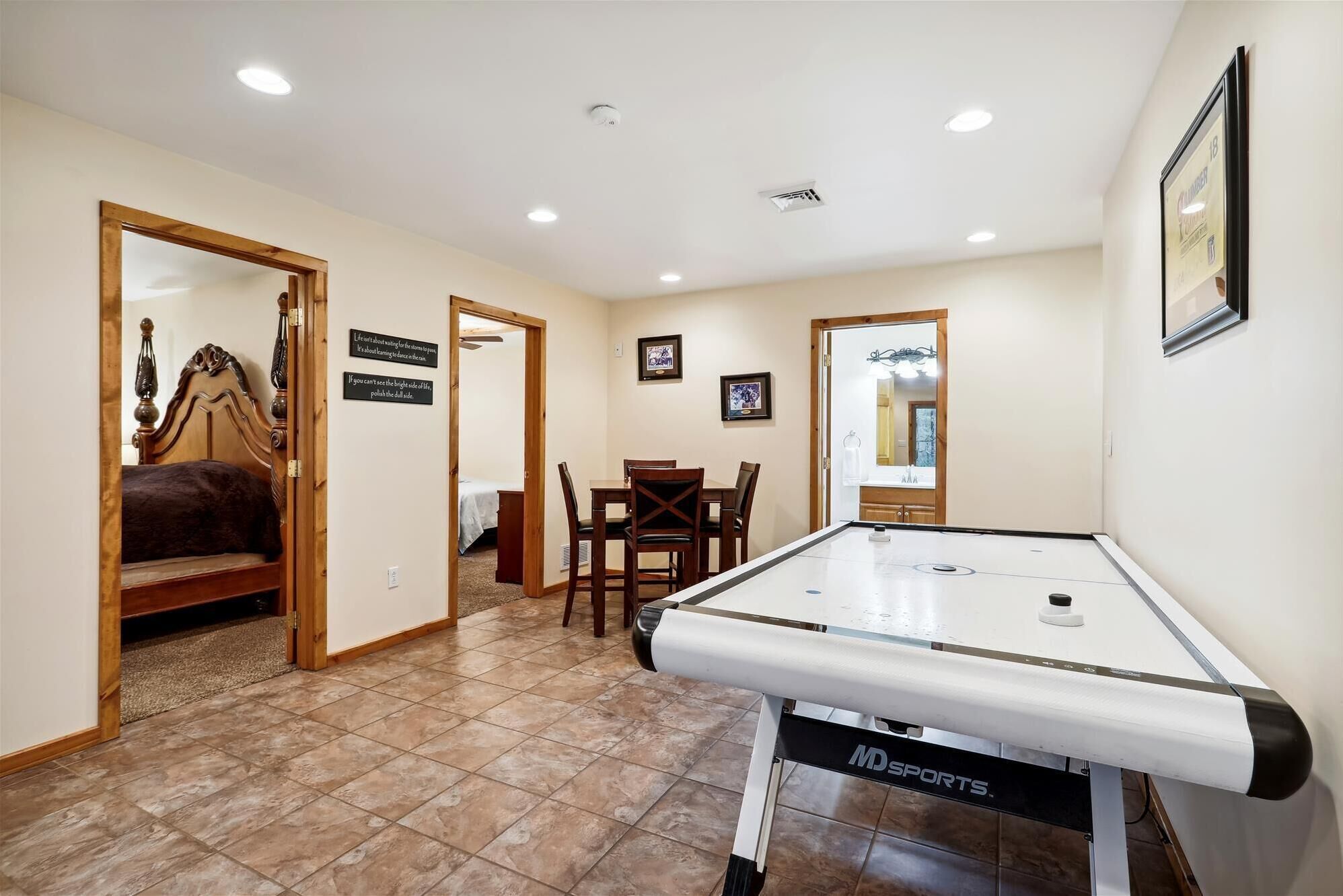 Recreation Room - Lower Level. With entertainment table and chairs.