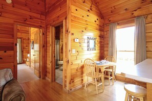 Dining - One of the coziest log cabins in the Smokies! With a hot tub and a jacuzzi tub! (Pigeon Forge)