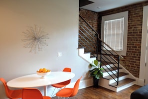 A true retro dining table that seats 4 - Vintage Advertisements Themed  luxury condo, 2 blocks from French Quarter (New Orleans)