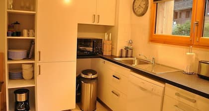 Un charmant appartement de 2 chambres au rez-de-chaussée avec jardin privé