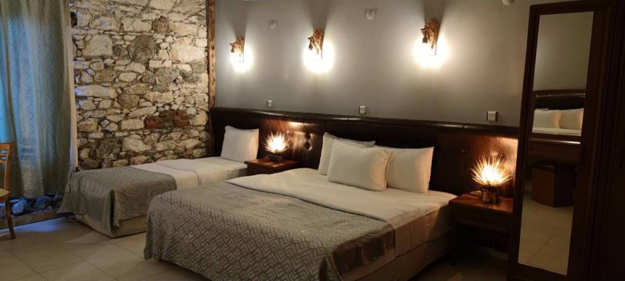 standard triple room | in-room safe, desk, iron/ironing board, rollaway beds