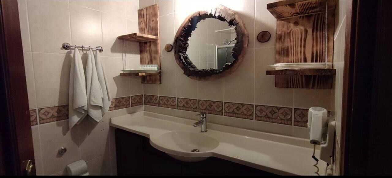 family room | in-room safe, desk, iron/ironing board, rollaway beds