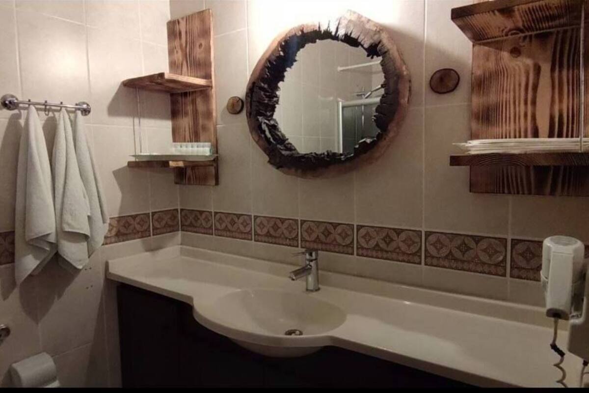 family room | in-room safe, desk, iron/ironing board, rollaway beds