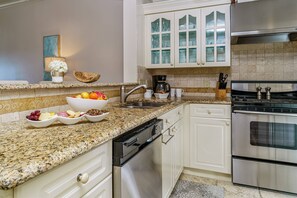 Open & Well Equipped Kitchen with Stainless Steel Appliances