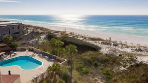 A beachfront property with a swimming pool, beach access, and a view of the ocean. - BREATHTAKING WATER VIEWS!!! Pools/Hot TubRestaurant/Pickleball/PutPutGolf - Tops'l Beach Manor (Miramar Beach)