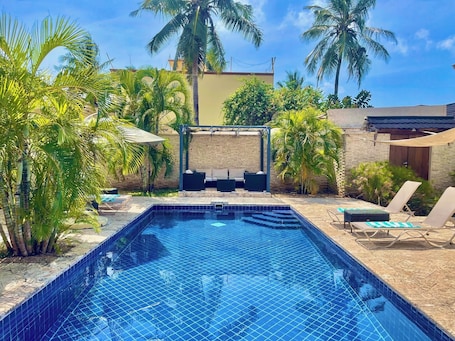 Outdoor pool, pool umbrellas, sun loungers