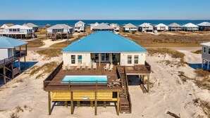 A beachfront house with a pool, deck, and multiple levels. - Sunset Blvd | Unmatched Ocean Views from private pool (Dauphin Island)