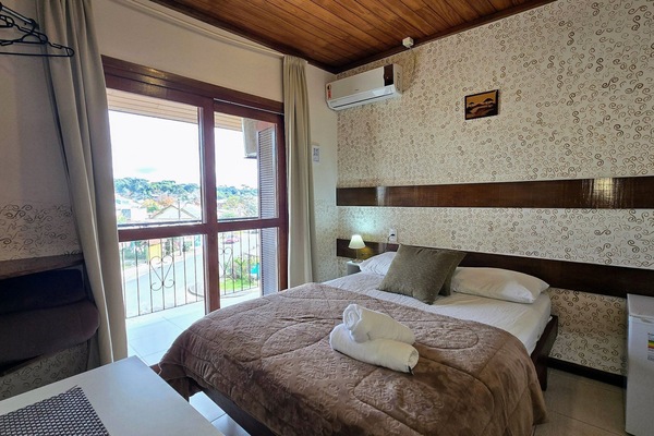 Superior Apartment, Patio, City View | Minibar, WiFi (free), bed sheets