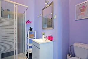 Bathtub, hair dryer, towels, soap