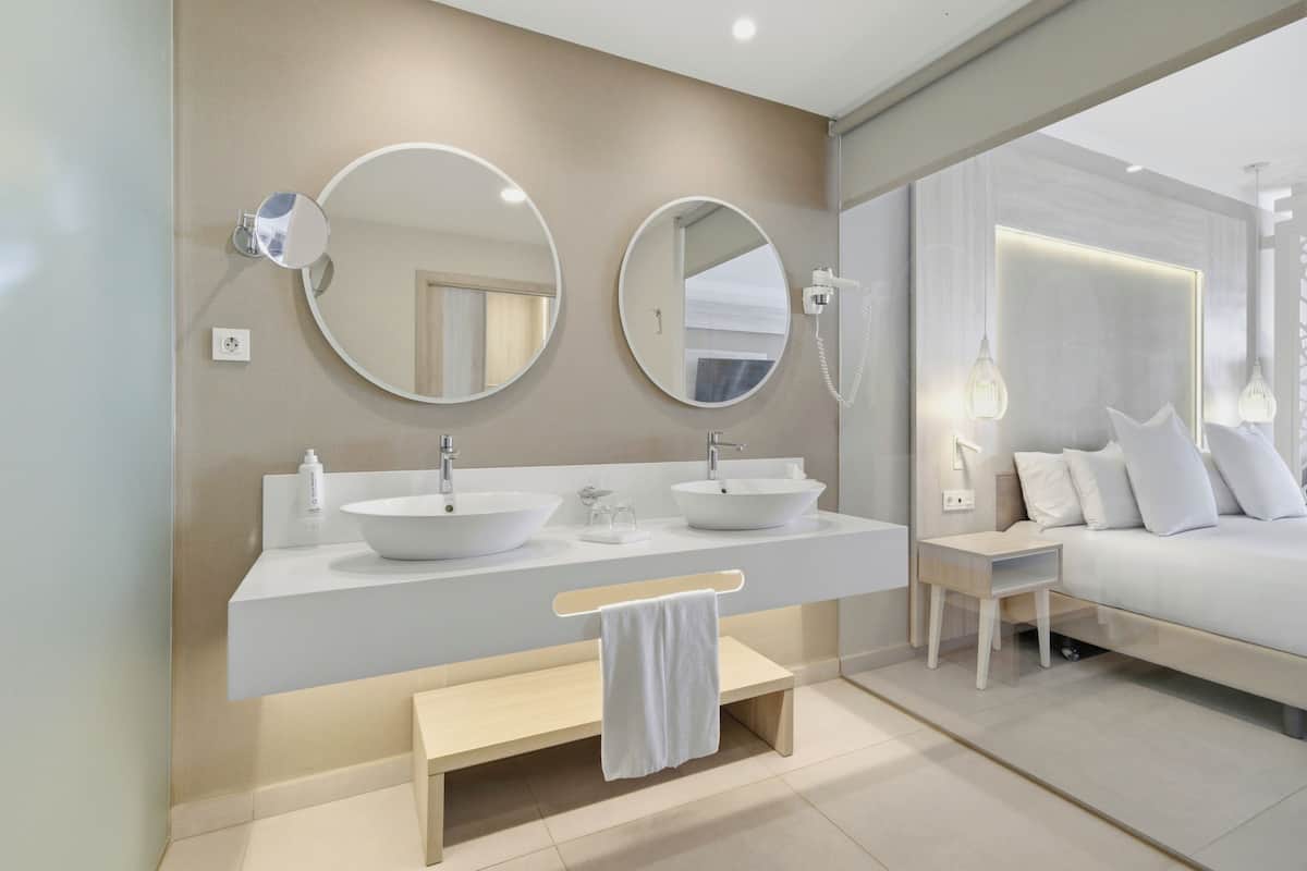 Premium bedding, down duvets, memory-foam beds, minibar