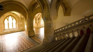 An interior with arched ceilings and a checkered floor. - The Highland Club (Fort Augustus)