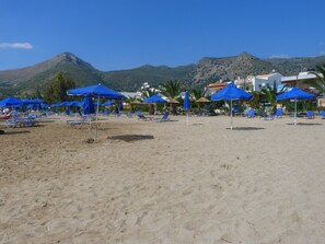 Una spiaggia nelle vicinanze, teli da spiaggia