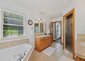 Shower, jetted tub, towels