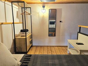 A compact bedroom with a bed, a desk, a wardrobe, and a mirror. - DELICIOUS LOFT TO SAN PIETRO (Roma)