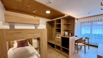 Quadruple Room | Down comforters, minibar, in-room safe, desk