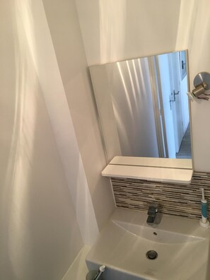 Shower, towels, soap, shampoo