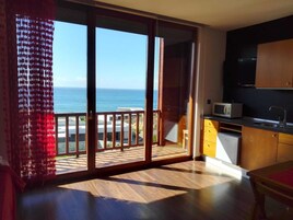 Superior Apartment, Balcony, Sea View | Living area | Flat-screen TV