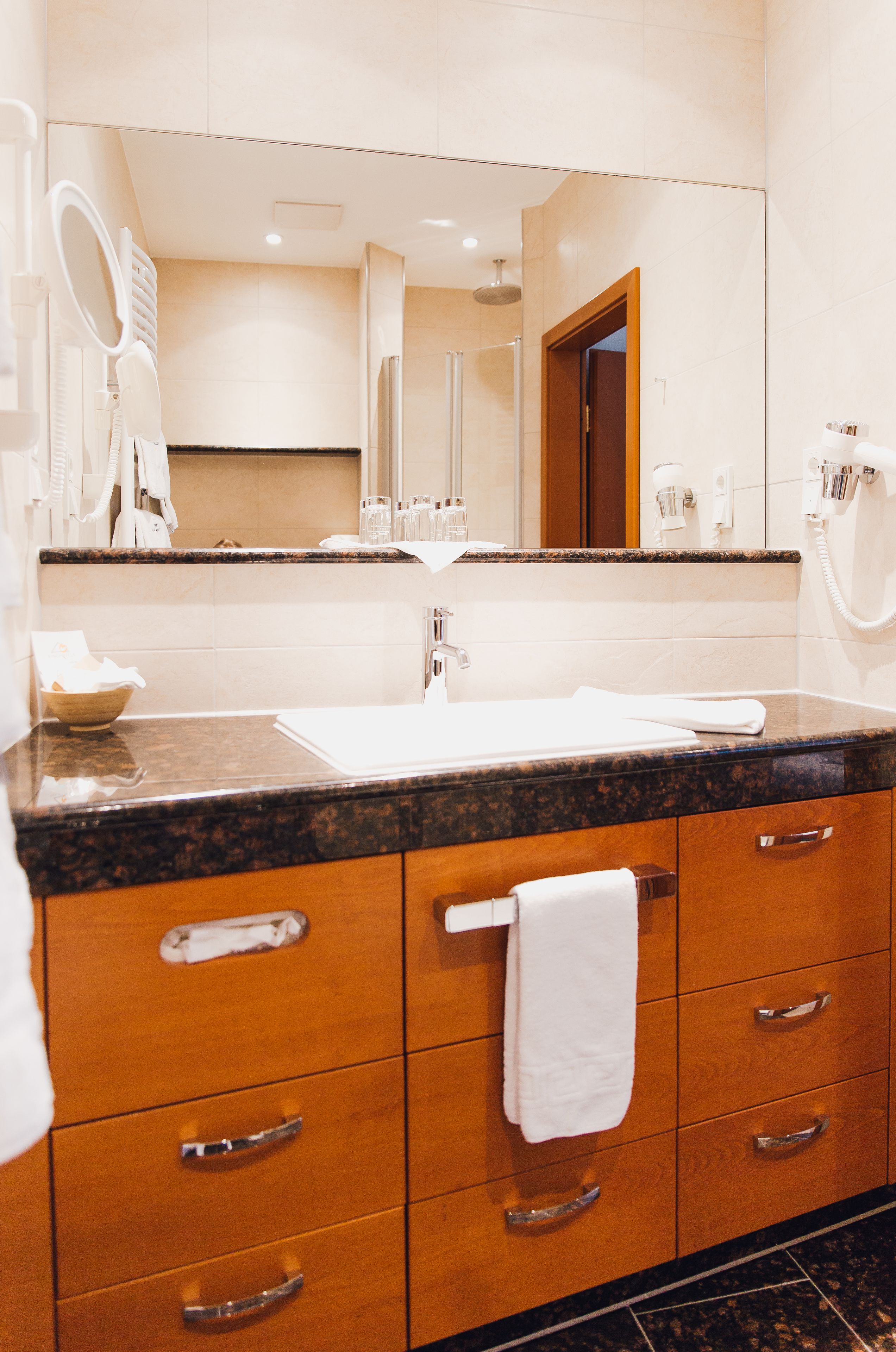 superior double room | bathroom | eco-friendly toiletries, hair dryer, bathrobes, towels