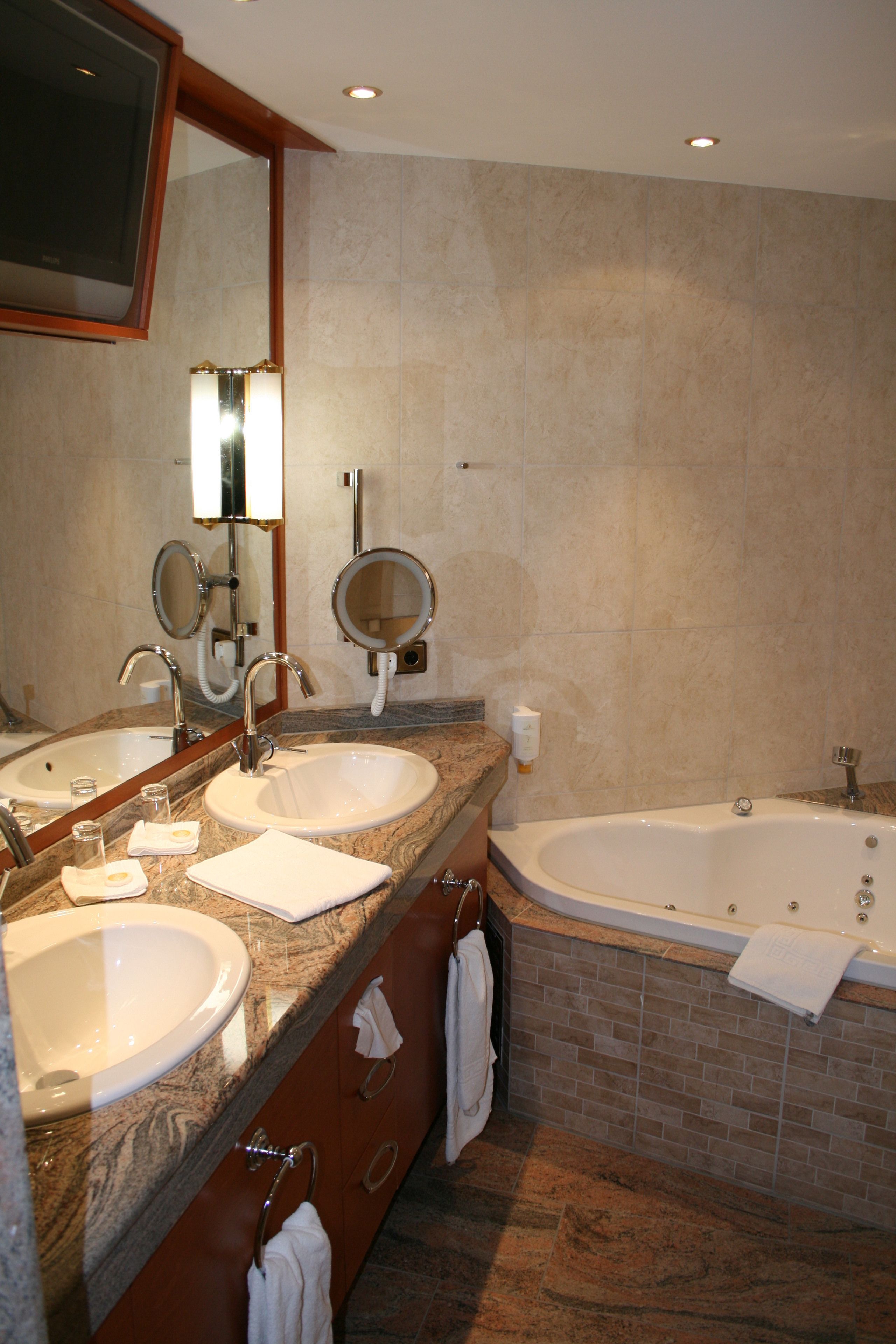 suite | bathroom | eco-friendly toiletries, hair dryer, bathrobes, towels