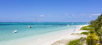 Pointe D'Esny feet in the water ib beautiful beach in Mauritius, quiet, wifi