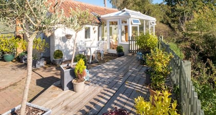 Mooie cottage studio gelegen in een prachtig landschap dicht bij de erfenis kust