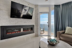 Flat-screen TV, fireplace, DVD player