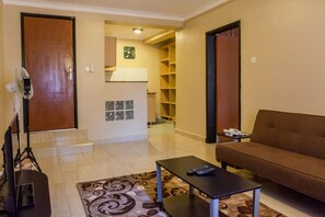 Executive Suite | Living area | TV - Sophies Signature Suites (Entebbe)