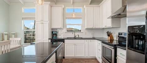 Fridge, microwave, dishwasher, coffee/tea maker