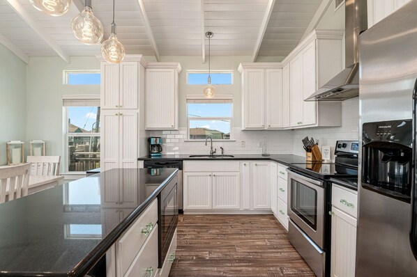 Fridge, microwave, dishwasher, coffee/tea maker