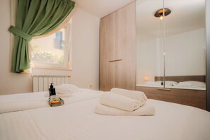 2 chambres, coffres-forts dans les chambres, Wi-Fi, draps fournis