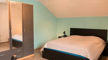 1 bedroom, desk, iron/ironing board, travel cot