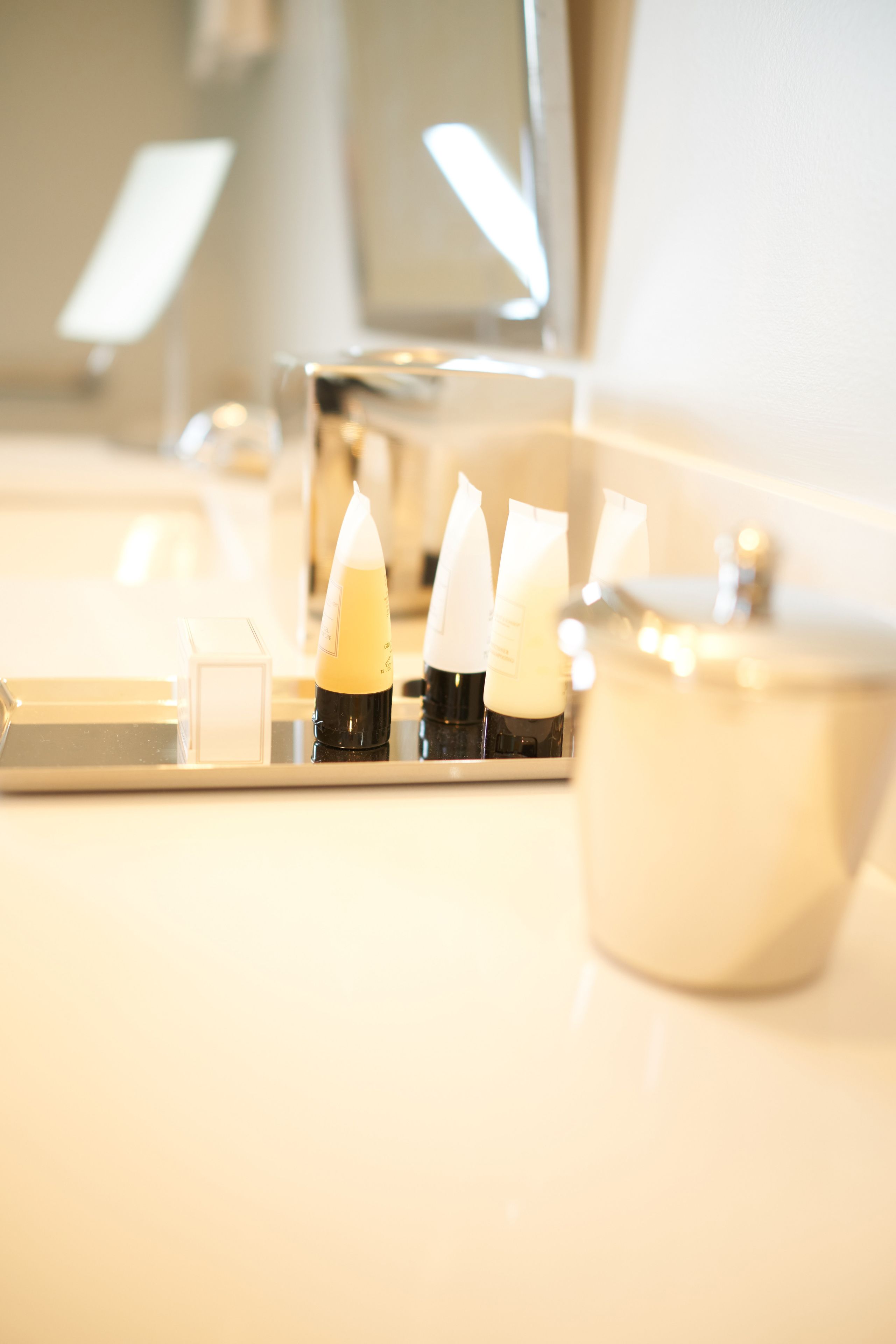 designer toiletries, hair dryer, bathrobes, towels