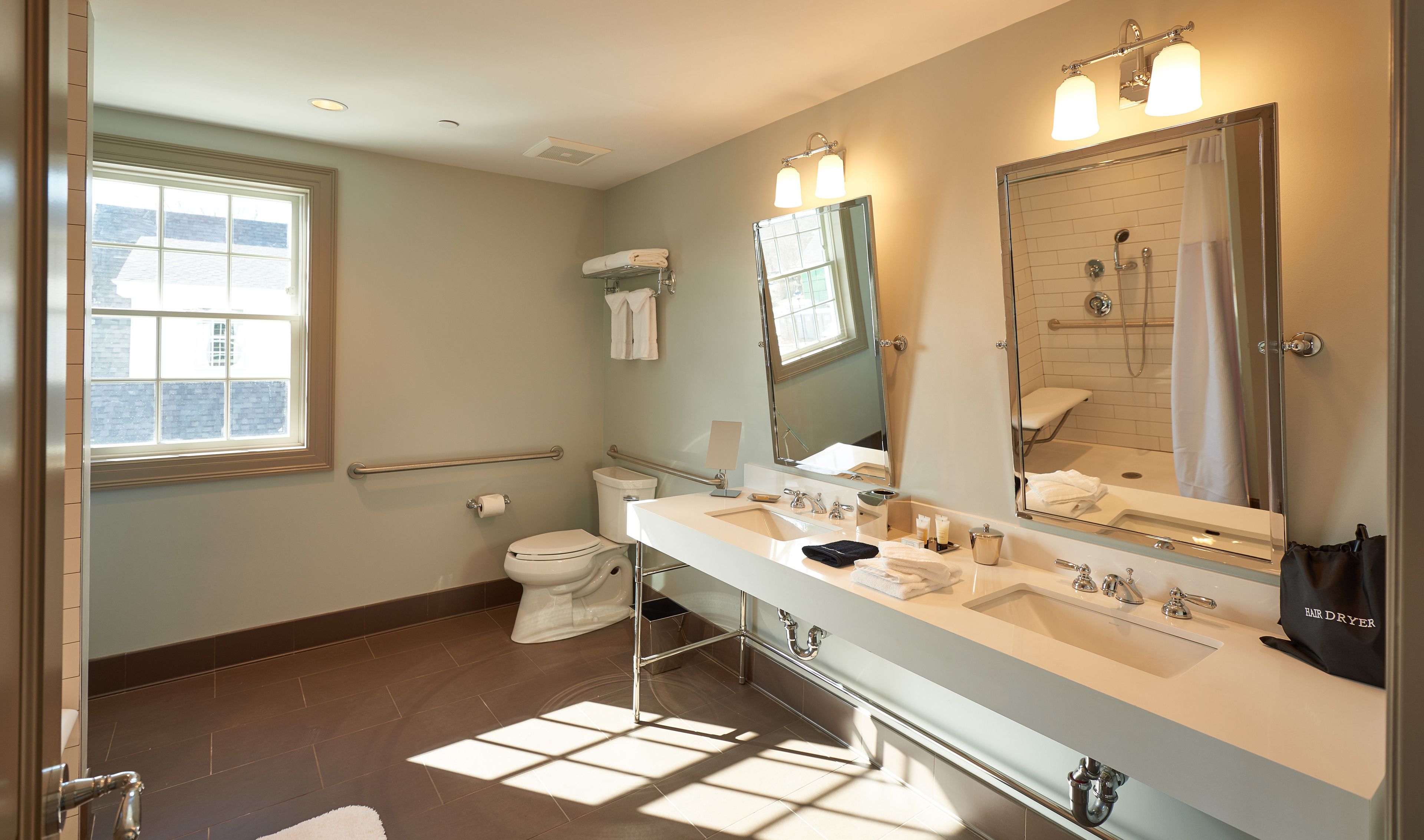 designer toiletries, hair dryer, bathrobes, towels