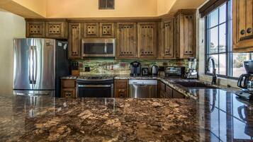 Coffee/tea maker, fridge, microwave, oven