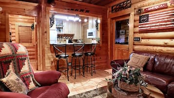 TV connectée, cheminée, lecteur de DVD, baby-foot