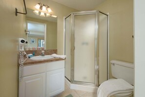 Shower, hair dryer, towels