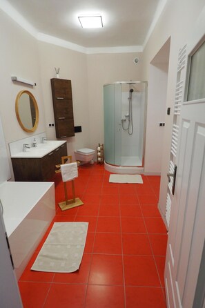 Bathtub, hair dryer, towels