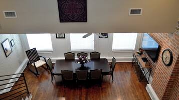 View down to kitchen and dining