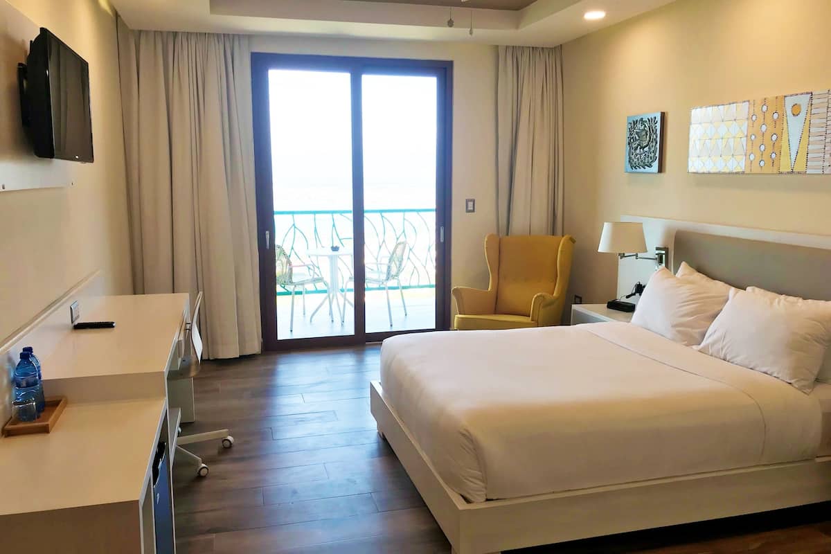 superior room, 1 queen bed, balcony, city view | in-room safe, desk, iron/ironing board, free rollaway beds