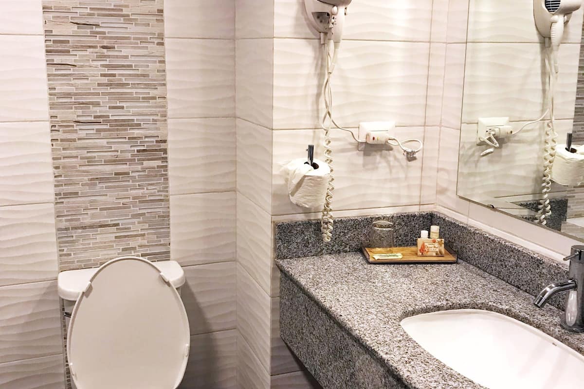 standard room, 1 queen bed, balcony, city view (disabled) | bathroom | shower, free toiletries, hair dryer, towels