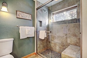 Hair dryer, towels, shampoo, toilet paper