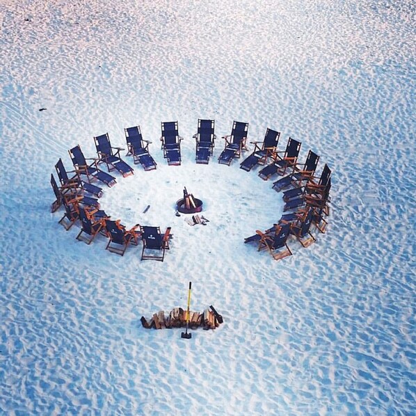 A circular arrangement of beach chairs on a sandy beach. - 2 Free Beach SRVCS- 4 chairs/2 umbrellas! Free Beach Bonfires M/F nts (Miramar Beach)